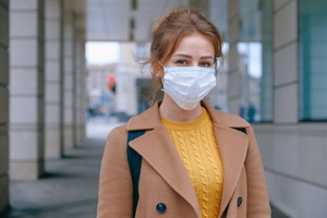 woman wearing Coronavirus mask